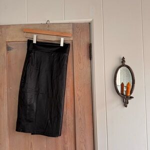 Woman’s Black Faux Leather Pencil Skirt - Sleek High-Rise Style